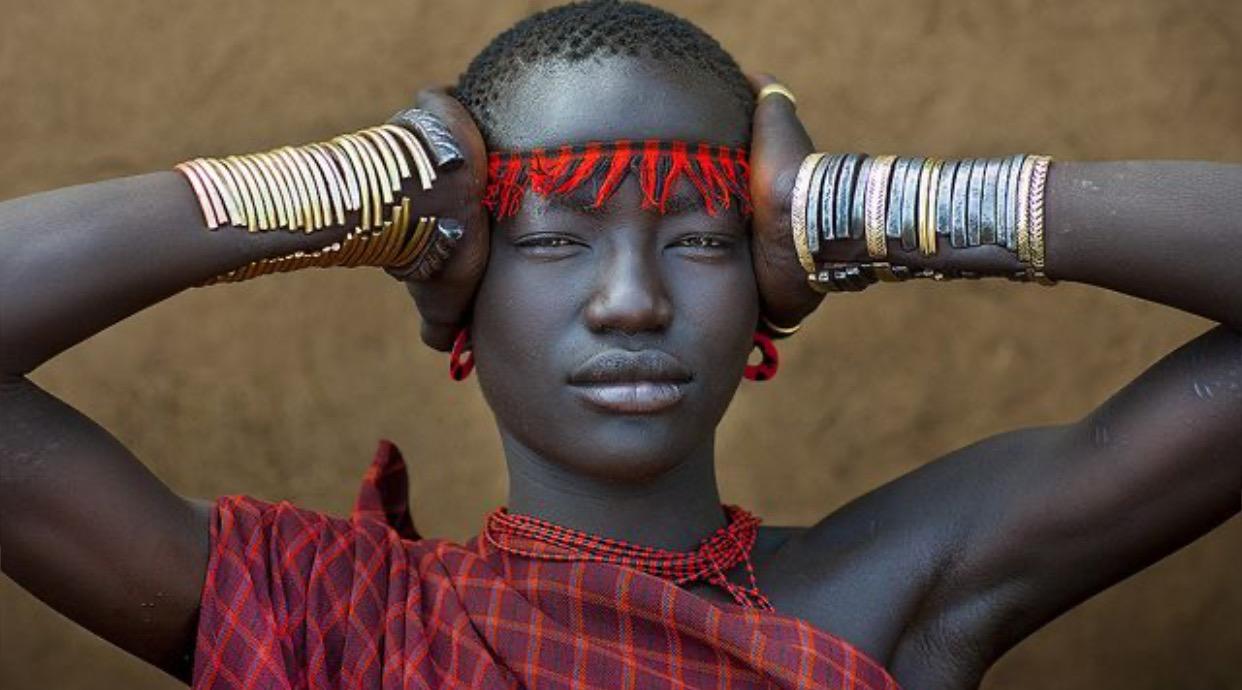 Miss Domoget, impressive Bodi tribe woman with traditional headband